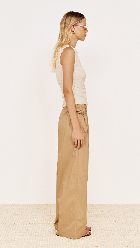 Boat Neck Rib Detail Mesh Top in Cream worn with beige wide-leg trousers, side view of the outfit against a neutral background.