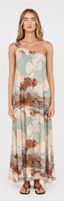 Model wearing Island Print One Shoulder Maxi Dress with scenic seaside print and relaxed silhouette.