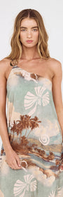 Model wearing Island Print One Shoulder Maxi Dress featuring scenic seaside print and relaxed silhouette.