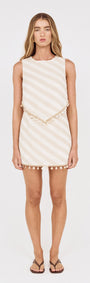 Cotton Linen Blend Tassel Top with Shell Detail on model, featuring striped pattern and tassel trim.