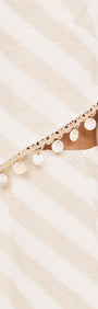 Cotton Linen Blend Tassel Top with Shell Detail featuring side cutout and shell disc trim on a soft diagonal stripe.