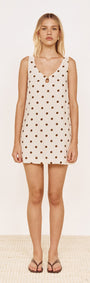 Gold Detail Keyhole Mini Dress in Chocolate Spot featuring cream base with chocolate spots and deep V-neckline.