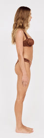Side view of a model wearing the Satin Effect Gathered Bikini Top in Bronze, showcasing its gathered design and rich tone.
