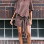 Model wearing a Striped Tie Waist Jersey Mini Dress with chocolate stripe print, featuring a relaxed style and adjustable tie at the waist.