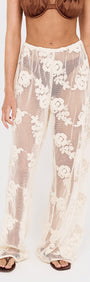 Embroidered Net Relaxed Beach Pant featuring floral embroidery and wide-leg silhouette for stylish beach days.