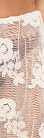 Embroidered Net Relaxed Beach Pant showcasing floral embroidery and open-net design, perfect for beach days.