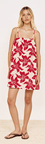 Cotton A-Line Mini Dress in Red Floral worn by a model, showcasing a bold red floral print and relaxed silhouette.