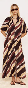 Puff Sleeve Belted Shirt Dress in Abstract Stripe worn by a model, featuring diagonal stripe print in chocolate, burgundy and neutrals.