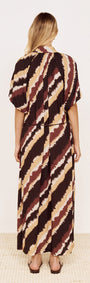 Back view of Puff Sleeve Belted Shirt Dress in Abstract Stripe with diagonal stripes in chocolate and burgundy.