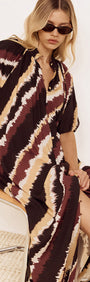 Puff Sleeve Belted Shirt Dress in Abstract Stripe worn by model, featuring an abstract diagonal stripe print.