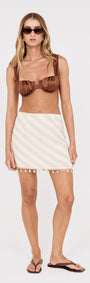 Cotton Linen Blend Mini Skirt with Shell Detail worn by a model, showcasing a stylish beach look with soft stripes.