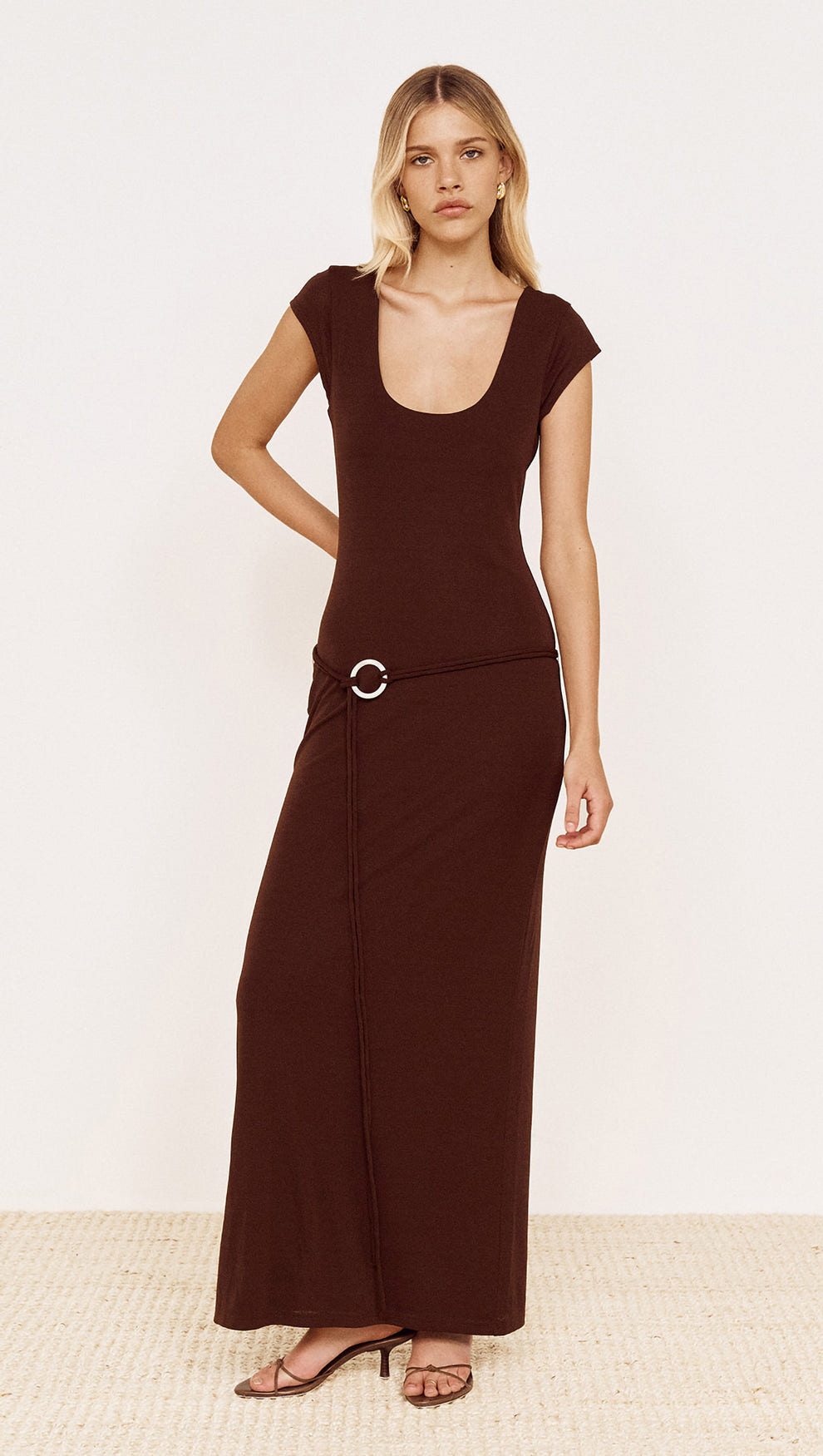 Cap Sleeve Mesh Maxi Dress in Chocolate worn by a model, featuring a scoop neckline and statement ring hardware.