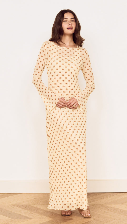 Butter Yellow Polka Dot Midi Dress featuring a boat neckline and flared sleeves in a lightweight fabric.