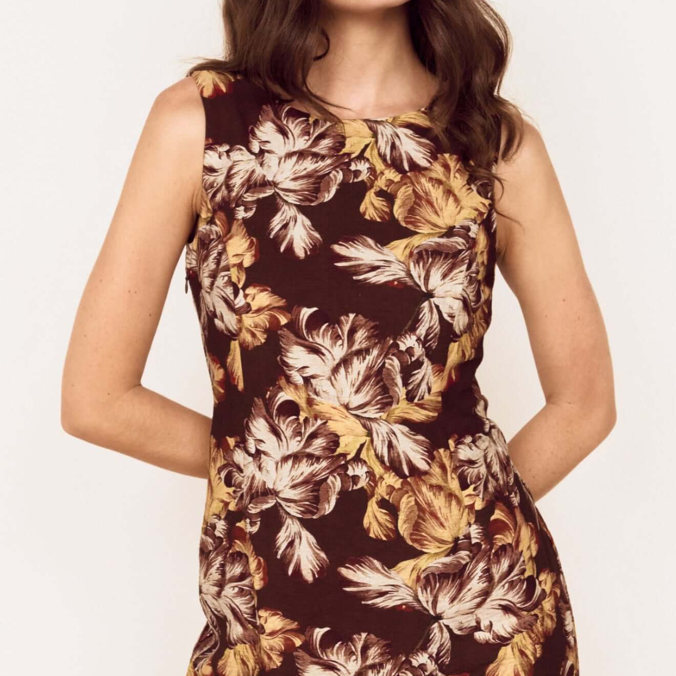 Brown Floral Tie Back Shift Dress worn by model, showcasing a fitted mini silhouette with floral print.