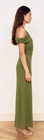Side view of a woman wearing a Green One Shoulder Mesh Midi Dress, showcasing its fitted silhouette and off-shoulder design.