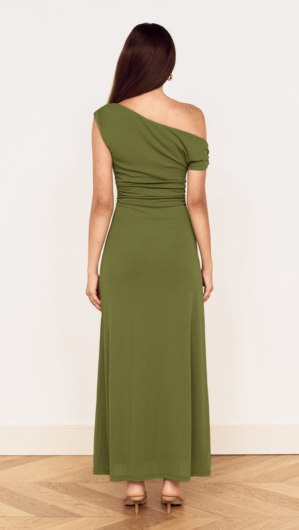Back view of Green One Shoulder Mesh Midi Dress showcasing its elegant fit and gathered detailing.