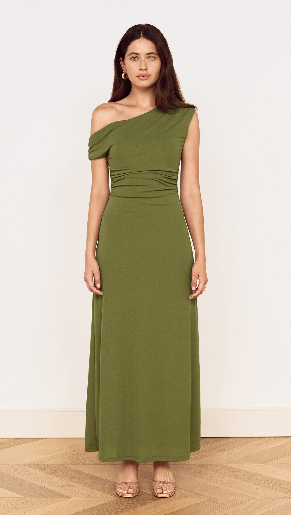 Green One Shoulder Mesh Midi Dress on a model showcasing its elegant off-shoulder design and gathered detailing.