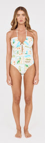 Model wearing Island Postcard One Piece with Shell Detail showcasing a postcard print and shell ring accent.