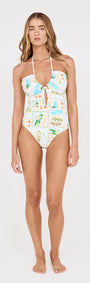 Woman modeling Island Postcard One Piece with Shell Detail in beach-inspired design and halter neckline.