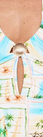 Island Postcard One Piece with Shell Detail featuring a halter neckline and shell ring accent.