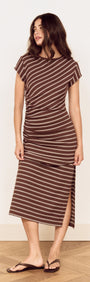 Model wearing a Striped Jersey Ruched Midi Dress with chocolate stripes and cap sleeves, showcasing stylish comfort.