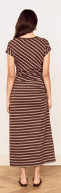 Model wearing a Striped Jersey Ruched Midi Dress, showcasing a chocolate stripe print from the back view.