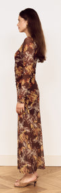 Brown Floral Gathered Mesh Midi Dress shown from the side view, featuring a sheer mesh fabric and oversized floral print.