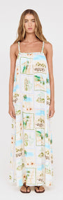 Model wearing Island Postcard Print Maxi Dress with Braided Straps featuring vibrant postcard-inspired print.