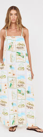 Model wearing Island Postcard Print Maxi Dress with Braided Straps featuring a postcard-inspired print and braided shoulder straps.