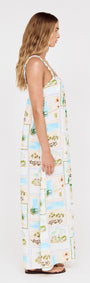 Side view of Island Postcard Print Maxi Dress with Braided Straps featuring a postcard-inspired print in blue and green tones.