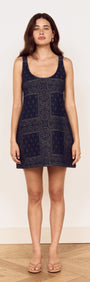 Paisley Jacquard Denim Mini Dress worn by a model showcasing its vintage-inspired design and A-line silhouette.