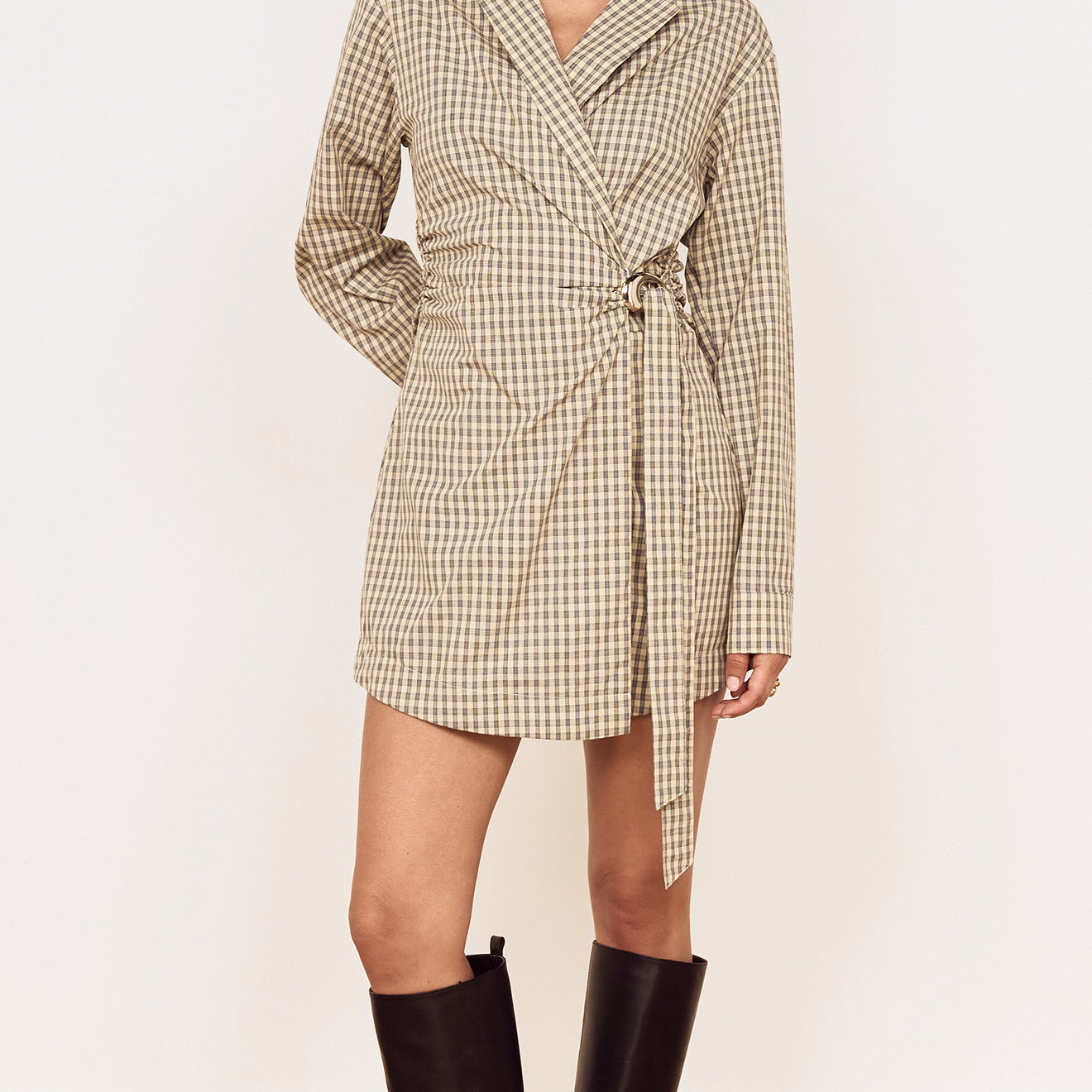 Cotton Wrap Detail Shirtdress in Blue Check worn by a model, showcasing a stylish wrap-front design and knee-high boots.