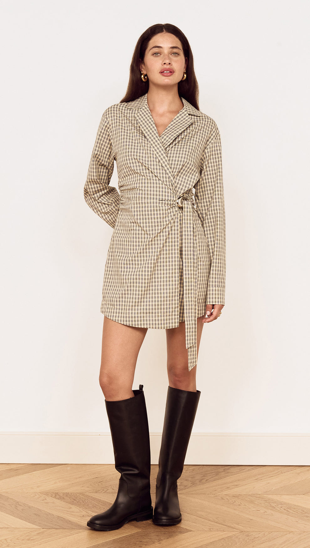 Cotton Wrap Detail Shirtdress in Blue Check worn by a model, showcasing a stylish wrap-front design and knee-high boots.