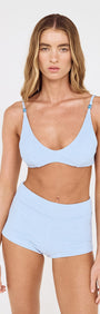 Model wearing Textured Swim Shorts in Sky Blue with a matching top, perfect for beach outings and poolside relaxation.