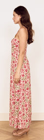 Vintage Floral Print Midi Dress with Bead Detail worn by a model, side view, showcasing floral design and fitted silhouette.
