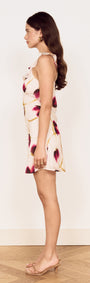 Floral Ruffle Detail Bias Mini Dress in a side view, showcasing floral print and ruffle detailing.