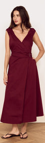 Cotton Wrap Detail Midi Dress in Burgundy worn by model, featuring deep V-neckline and belted waist.