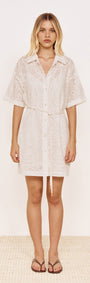 Cotton Broderie Mini Shirtdress in White worn by a model featuring short sleeves and a tie belt.