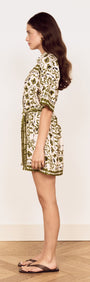 Scarf Print Shirt Dress in Olive showcased on a model in profile, featuring floral print and a self-tie waist belt.