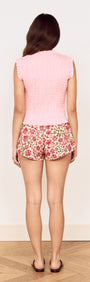 Linen Blend Shirred Top in Baby Pink worn with floral printed shorts, showcasing a feminine warm-weather outfit.