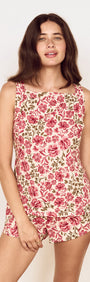 Vintage Floral Spring Tunic with Tie-Back worn by a model, showcasing vibrant floral print and stylish design.