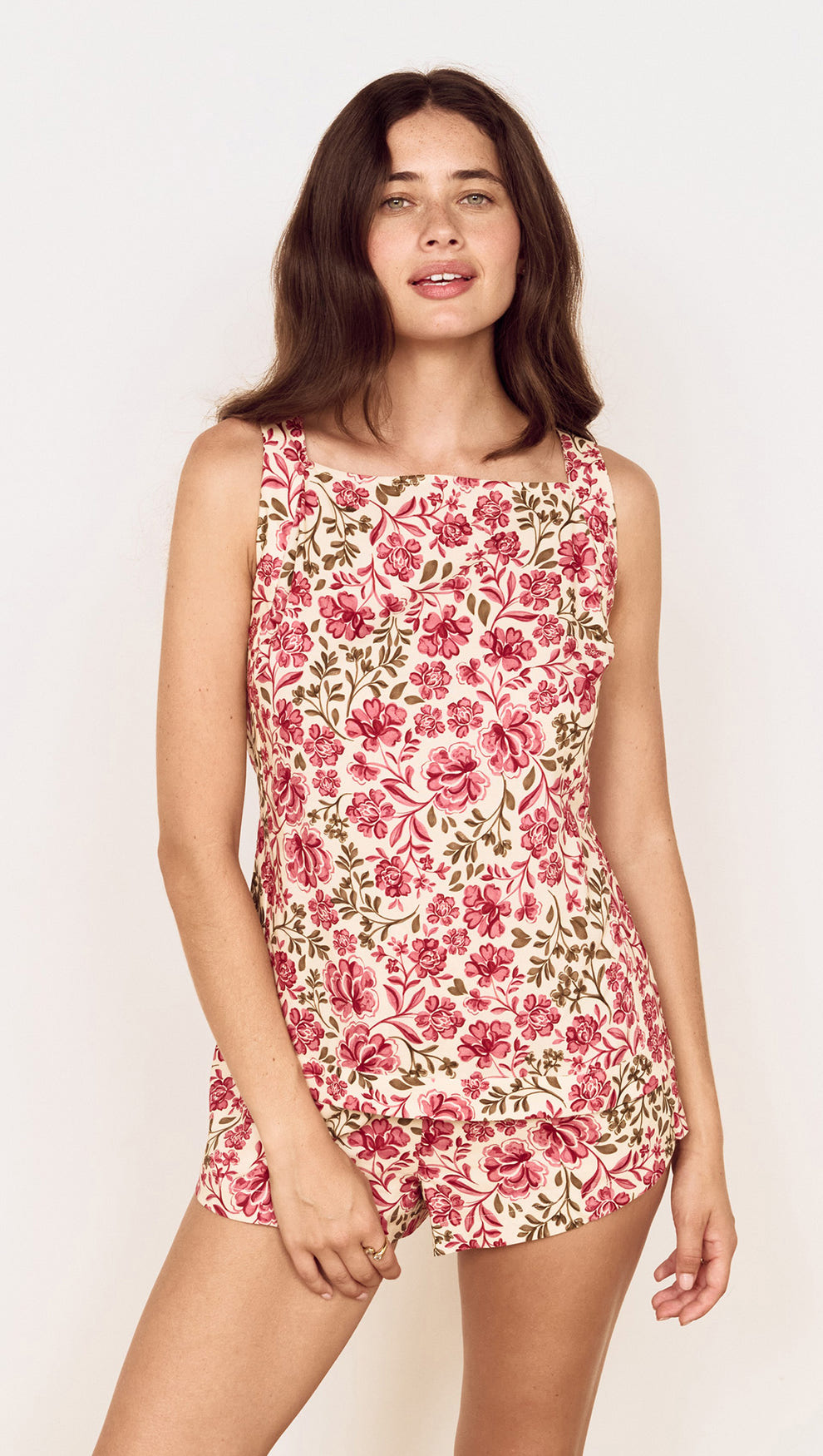 Vintage Floral Spring Tunic with Tie-Back worn by a model, showcasing vibrant floral print and stylish design.