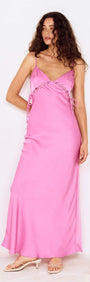 Fuchsia Bias Cut Maxi Dress with Lacing Detail showcased on a model in a stylish pose.