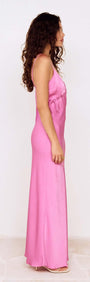 Fuchsia Bias Cut Maxi Dress with Lacing Detail displayed in a side view, showcasing its elegant silhouette and design.