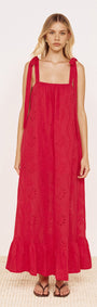 Cotton Broderie Maxi Sun Dress in Red worn by a model showcasing its relaxed silhouette and tie shoulder straps.