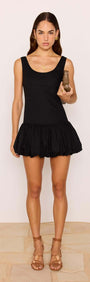 Cotton Linen Blend Black Bubble Mini Dress worn by model, showcasing scoop neckline and dramatic bubble hem.