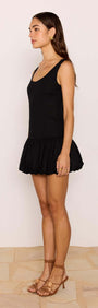 Cotton Linen Blend Black Bubble Mini Dress side view showcasing its scoop neckline and dramatic bubble hem.