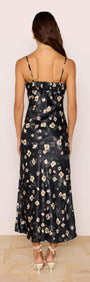 Back view of the Black Floral Bias Midi Dress featuring adjustable straps and a silky floral satin finish.