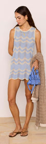 Model wearing the Blue & Cream Knit Mini Dress with a stylish cover-up and accessories.