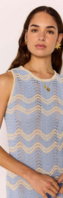 Model wearing Blue & Cream Knit Mini Dress featuring a soft wave knit pattern and scalloped hem.